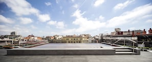 Seasonal outdoor pool, open 9:00 AM to 5:00 PM, pool umbrellas
