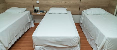 Standard Triple Room | 1 bedroom, minibar, desk, blackout drapes