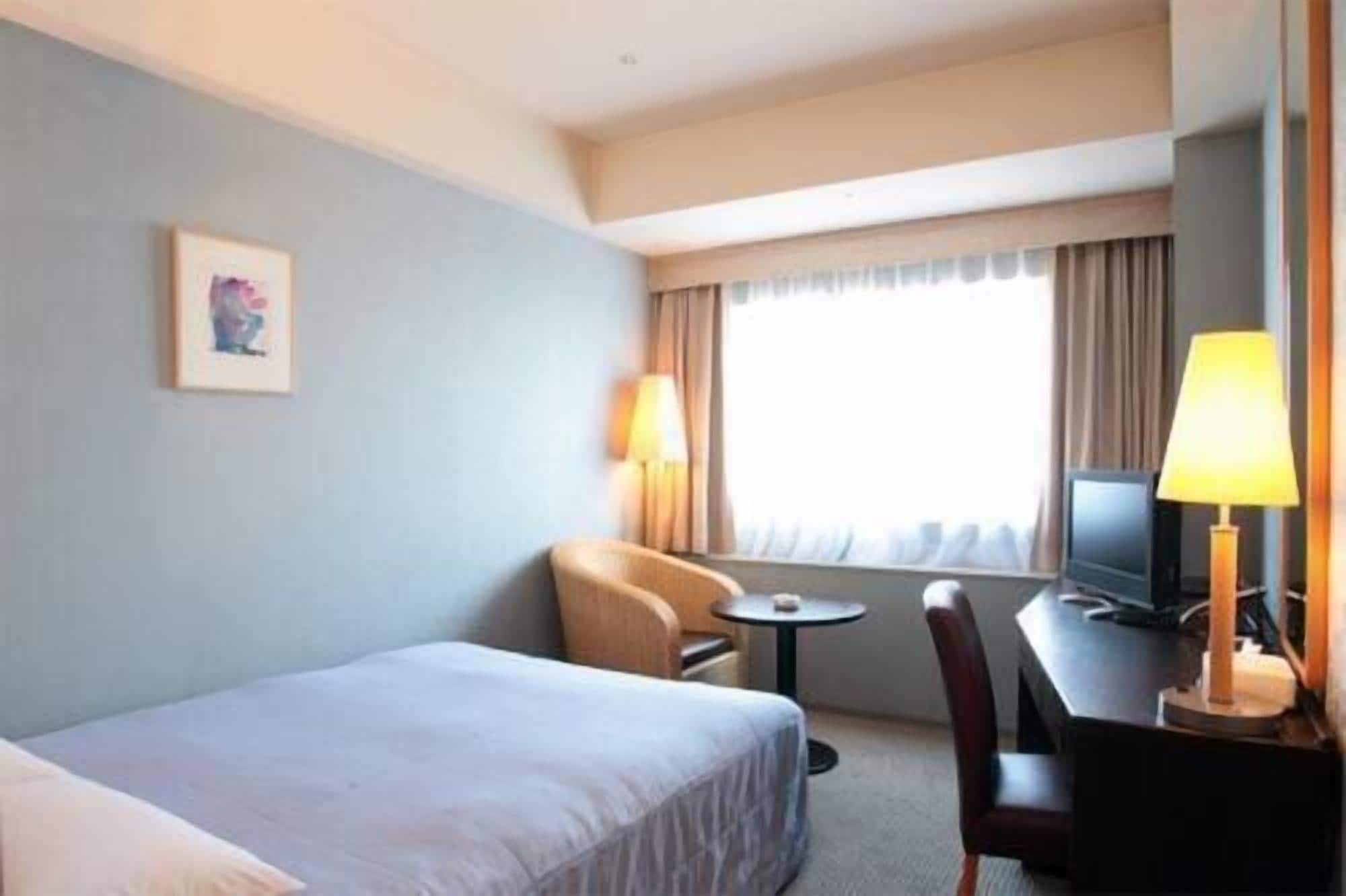 desk, blackout curtains, iron/ironing board, free wifi