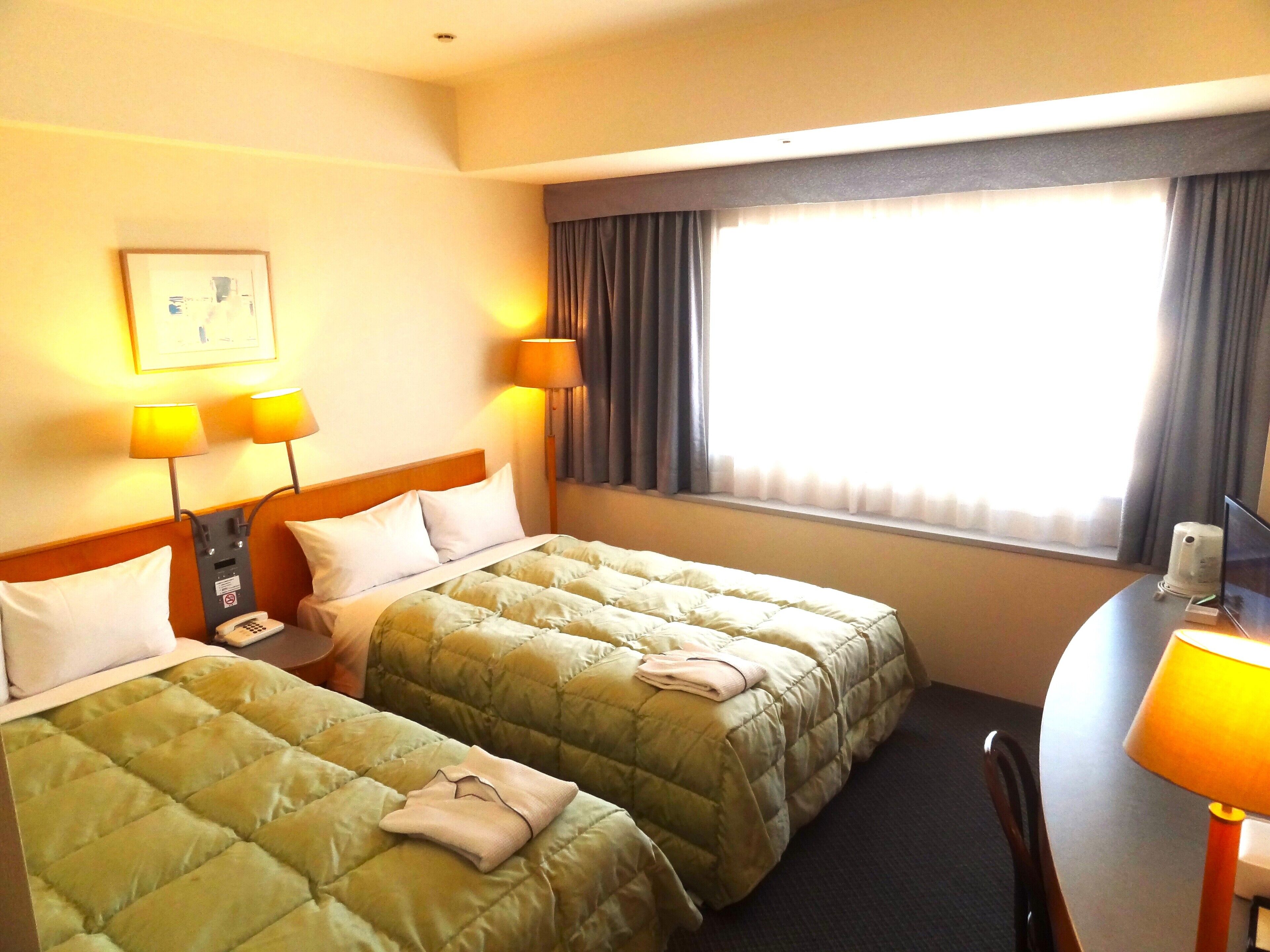 Family Twin Room, Non Smoking | Desk, blackout curtains, iron/ironing board, free WiFi