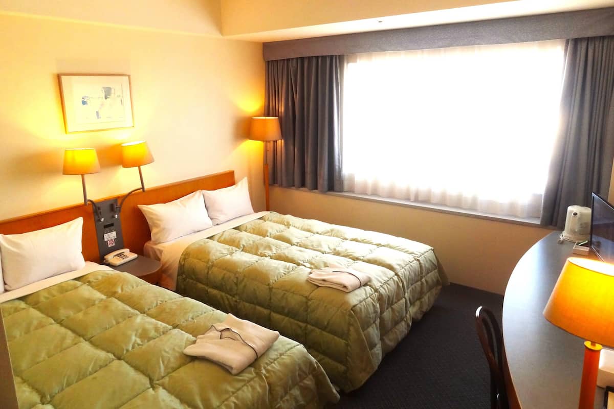 Family Twin Room, Non Smoking | Desk, blackout curtains, iron/ironing board, free WiFi