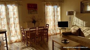 Deluxe Apartment, 3 Bedrooms | Living area