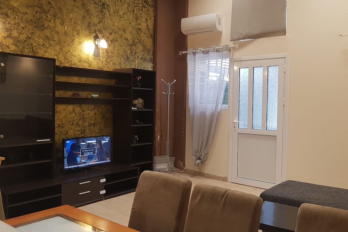 Deluxe Room | Living area | TV, fireplace