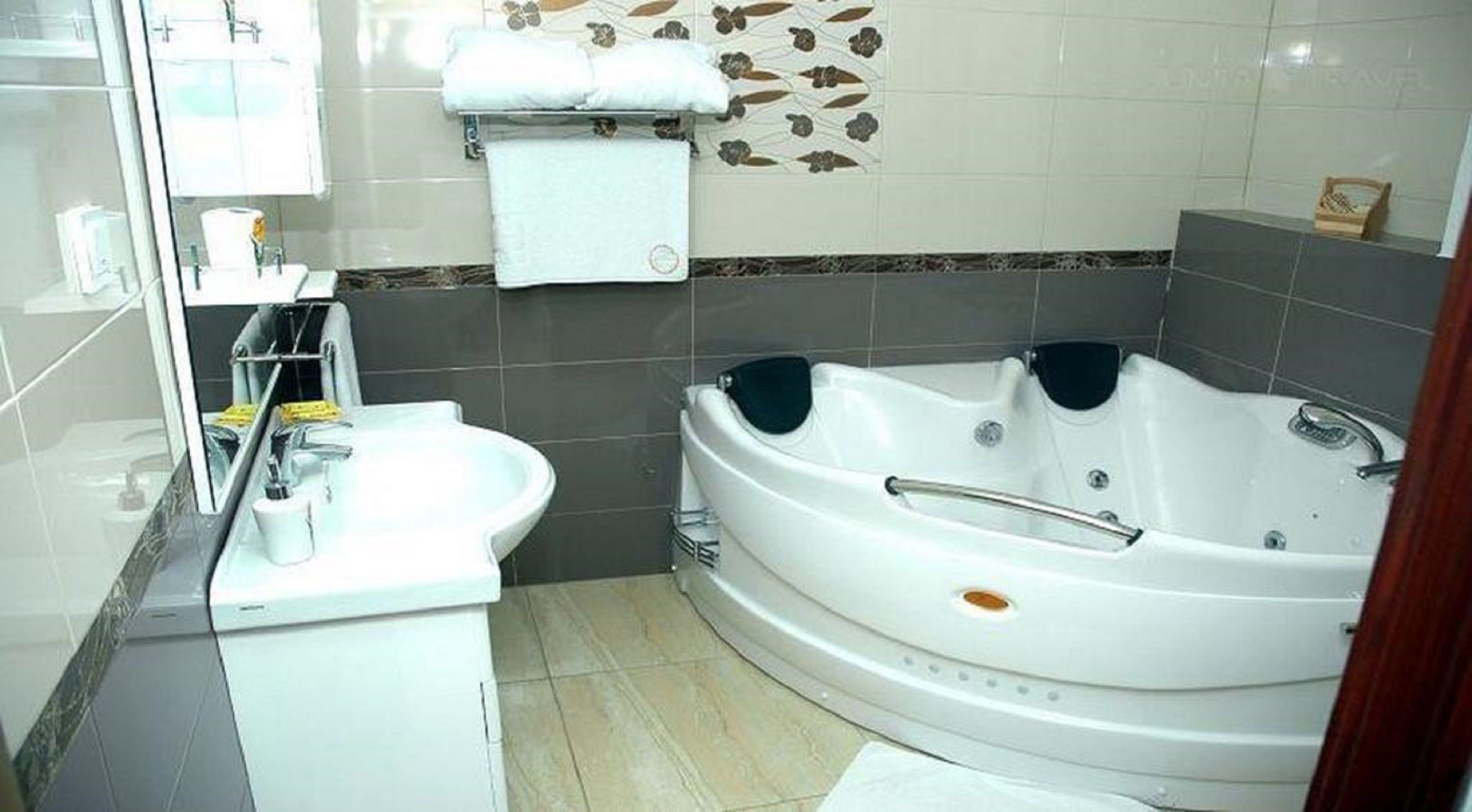 deluxe room | bathroom | bathtub, deep-soaking bathtub, free toiletries, hair dryer