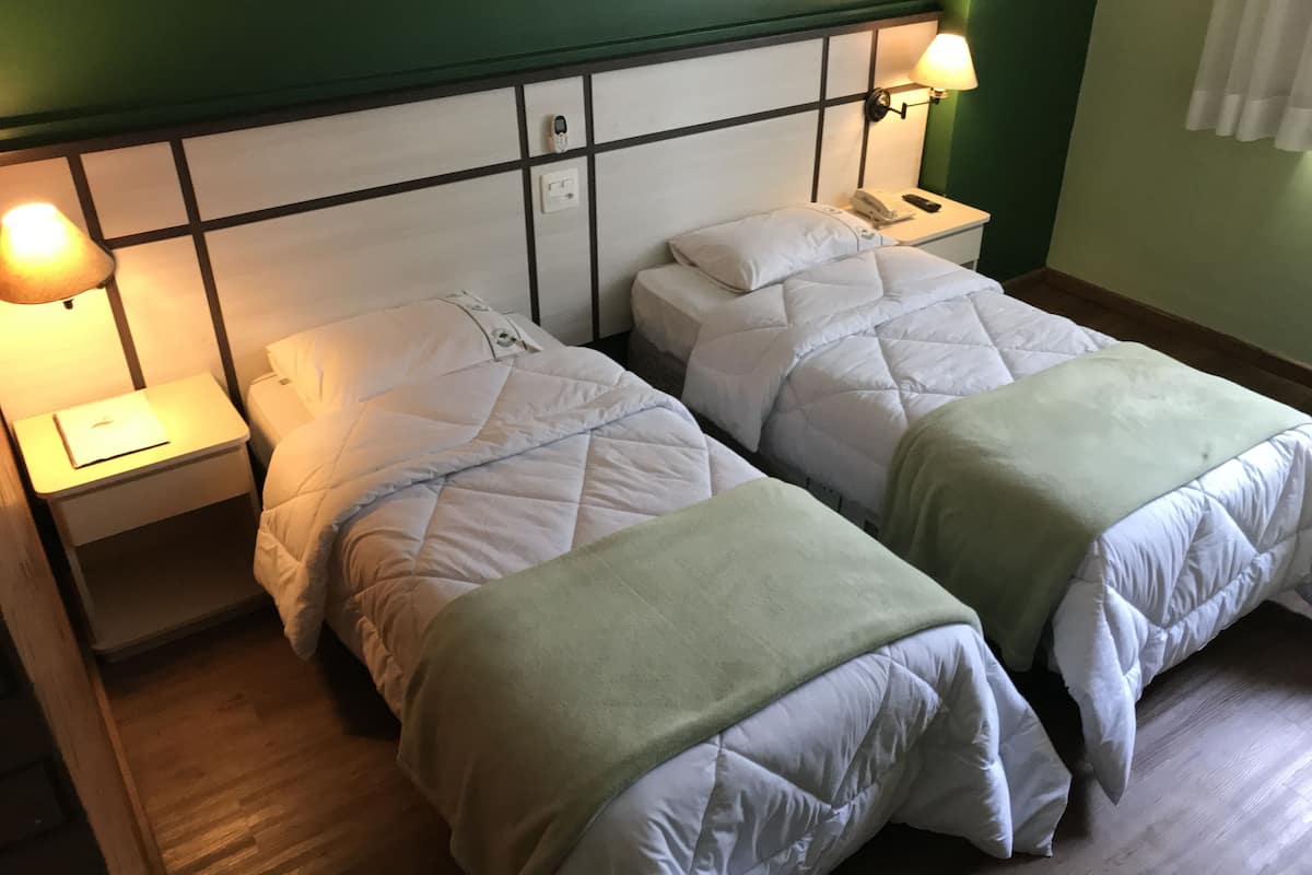 Minibar, desk, blackout curtains, iron/ironing board
