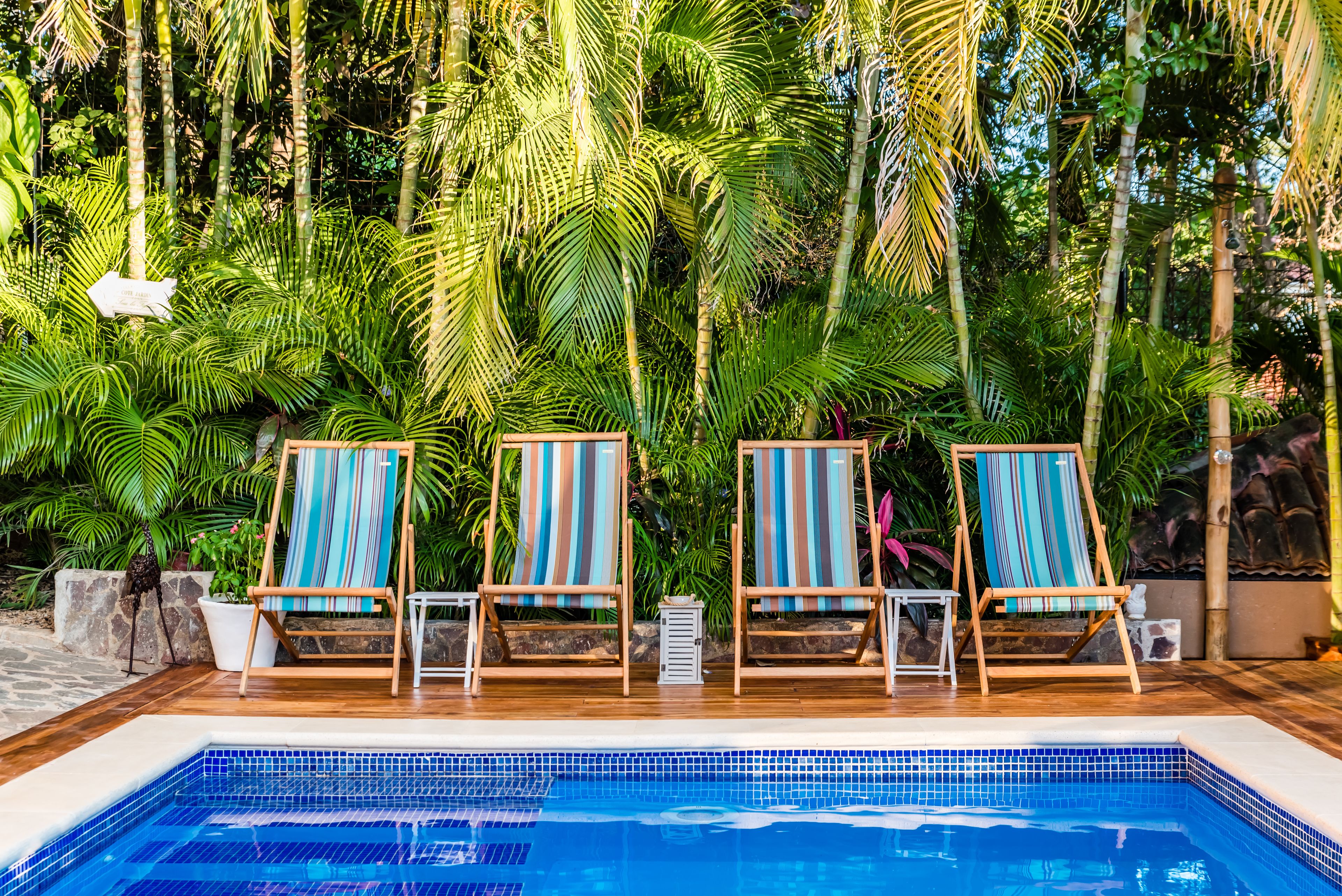 outdoor pool, open 8:00 am to 8:00 pm, pool loungers