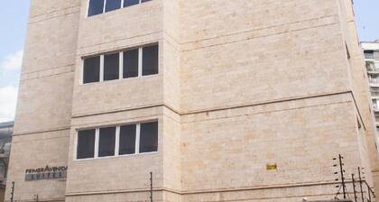 Hotel Cuarta Avenida Suites