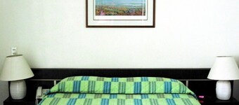 Hotel Cuarta Avenida Suites