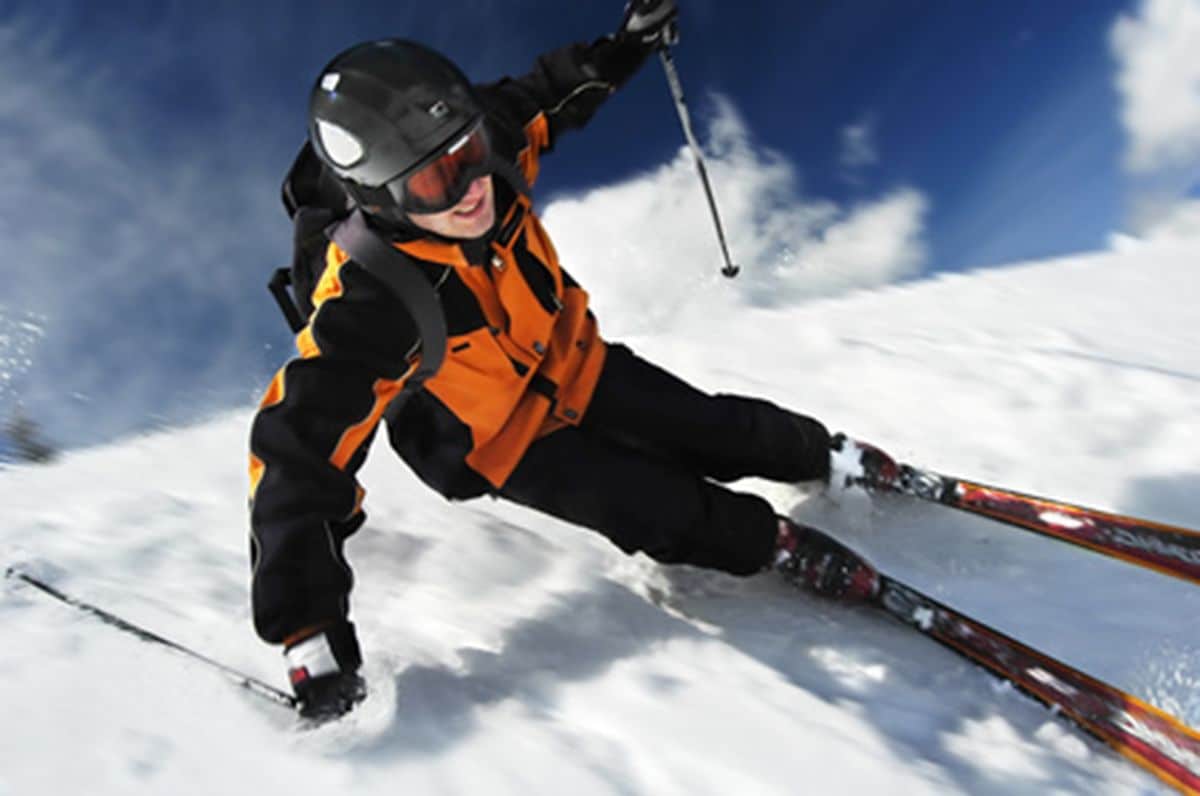 A person skiing on a snowy slope.