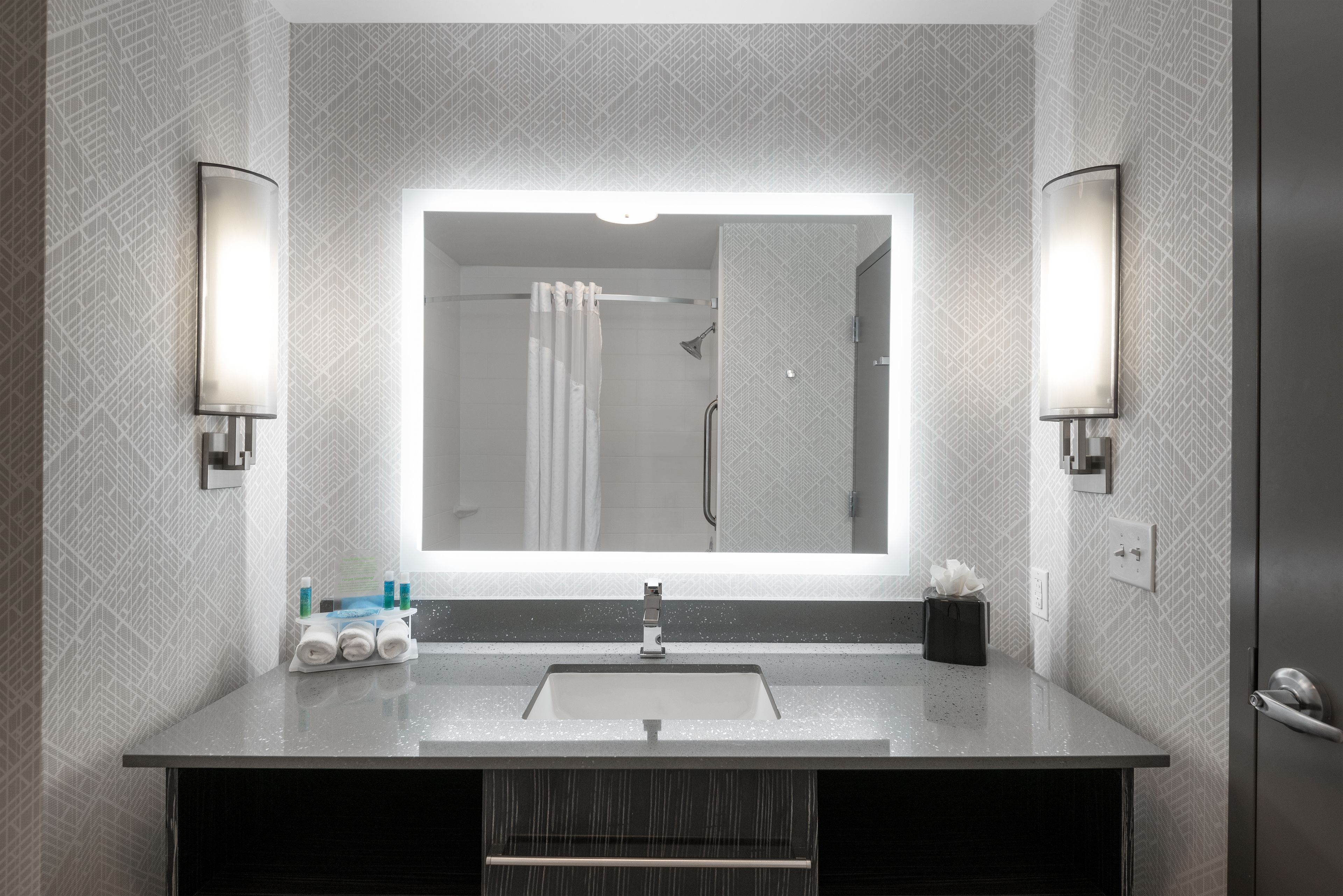 combined shower/bathtub, free toiletries, hair dryer, towels