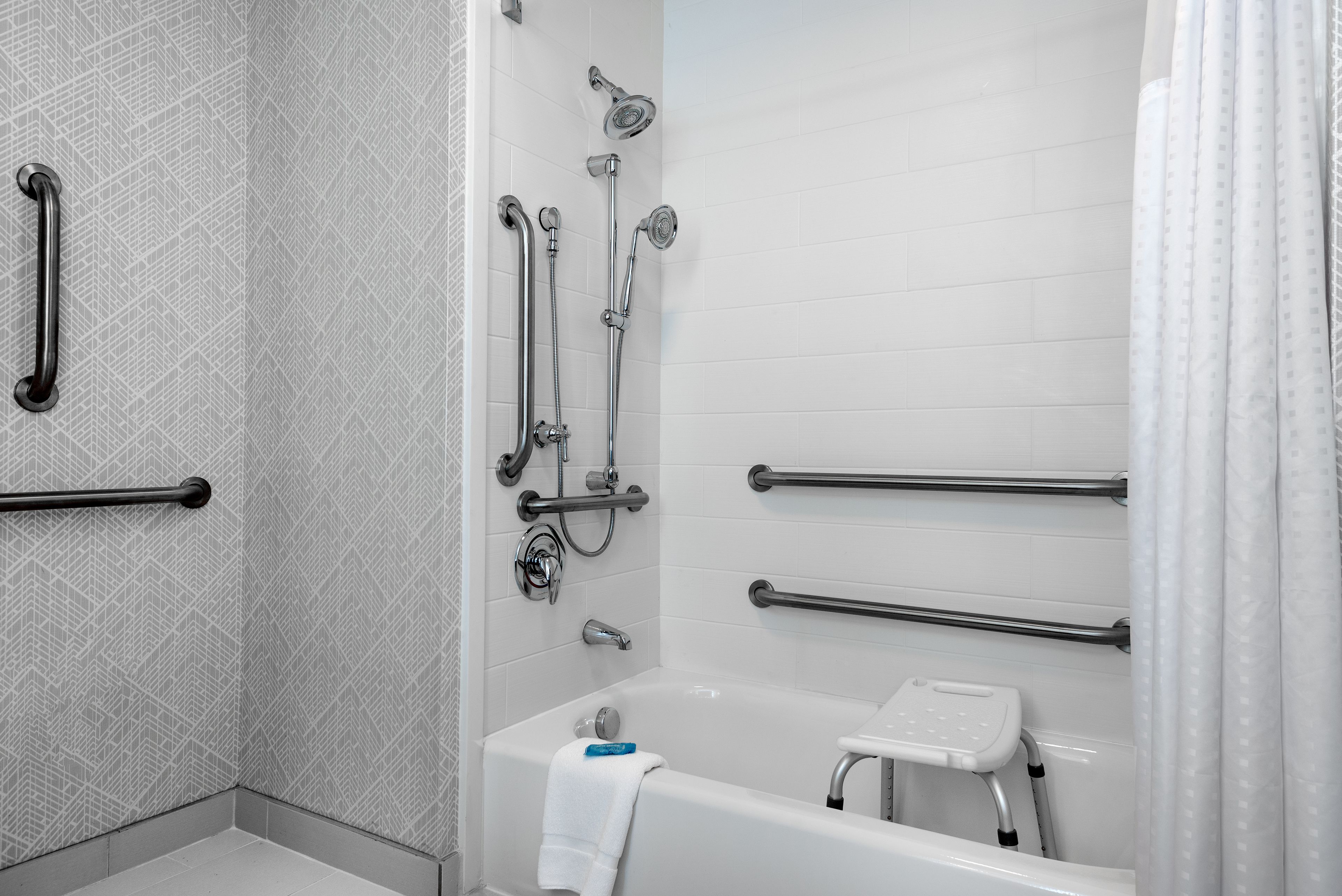 combined shower/bathtub, free toiletries, hair dryer, towels