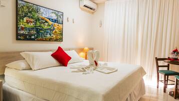 Apartamento Standard | Frigobar, cortinas blackout, Wi-Fi de cortesia