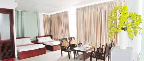 Family Room | Minibar, in-room safe, rollaway beds, free WiFi