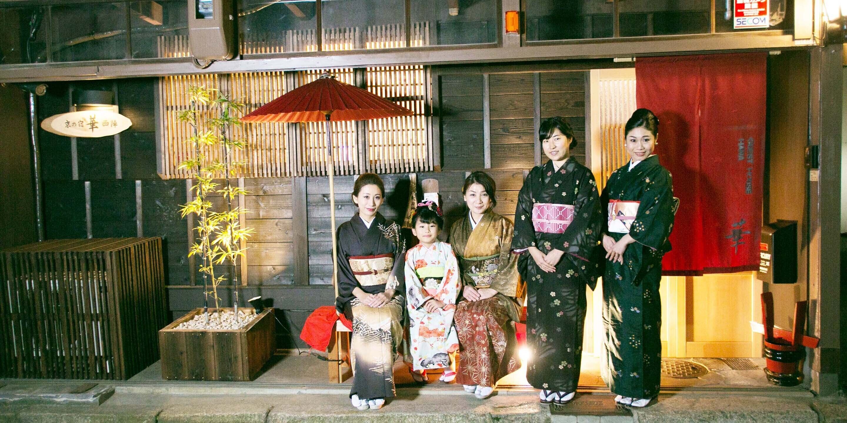A traditional Japanese setting with wooden elements and a red umbrella.
