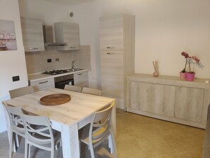 Traditional Apartment, 2 Bedrooms | Living area | 24-inch flat-screen TV with digital channels, TV, table tennis - Baia Etrusca (Piombino)
