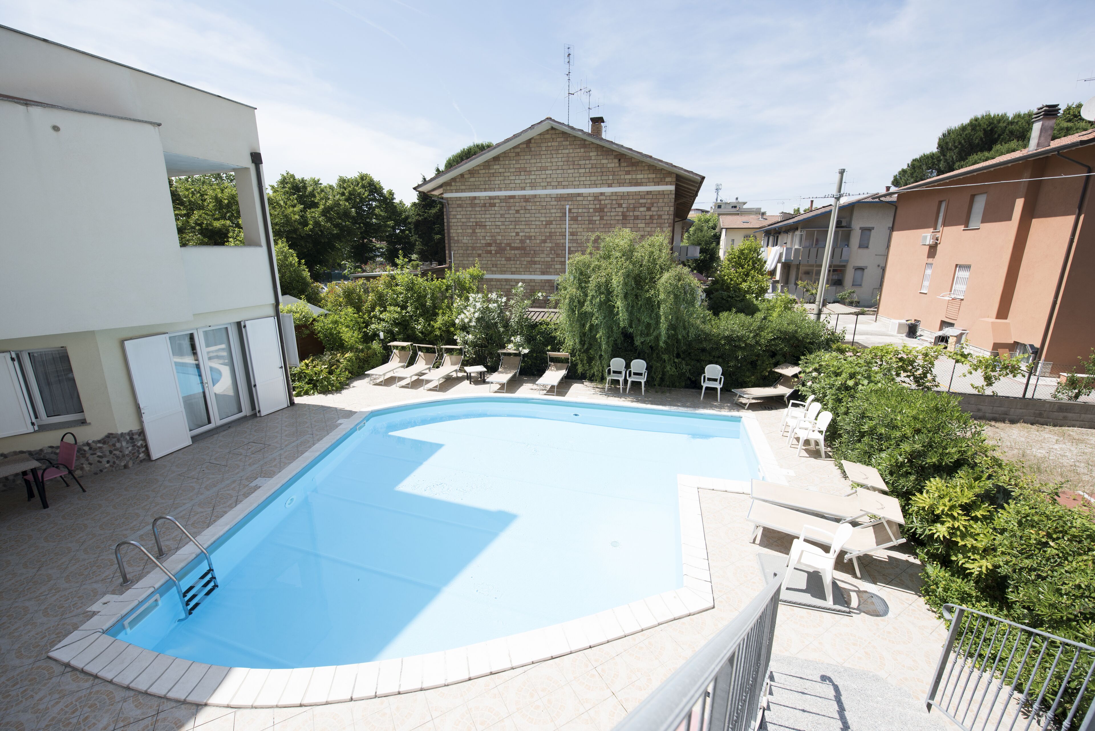 outdoor pool, pool loungers