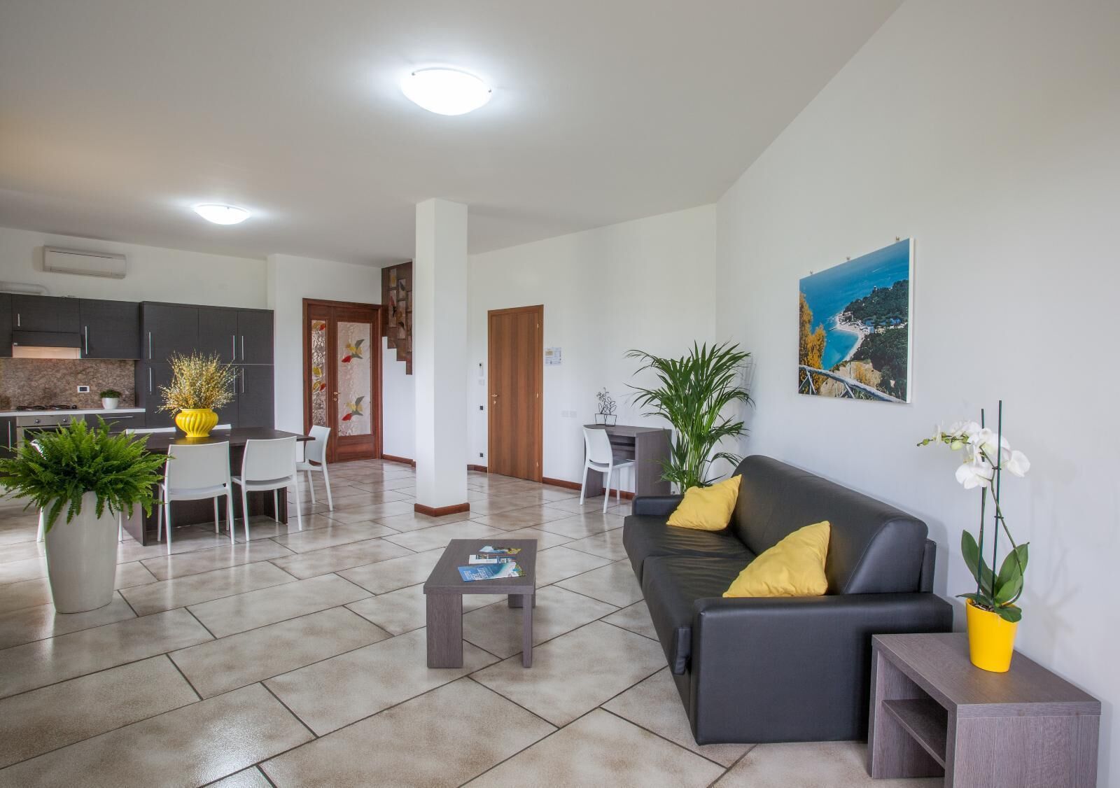 Family Apartment, Sea View | Living room | Flat-screen TV