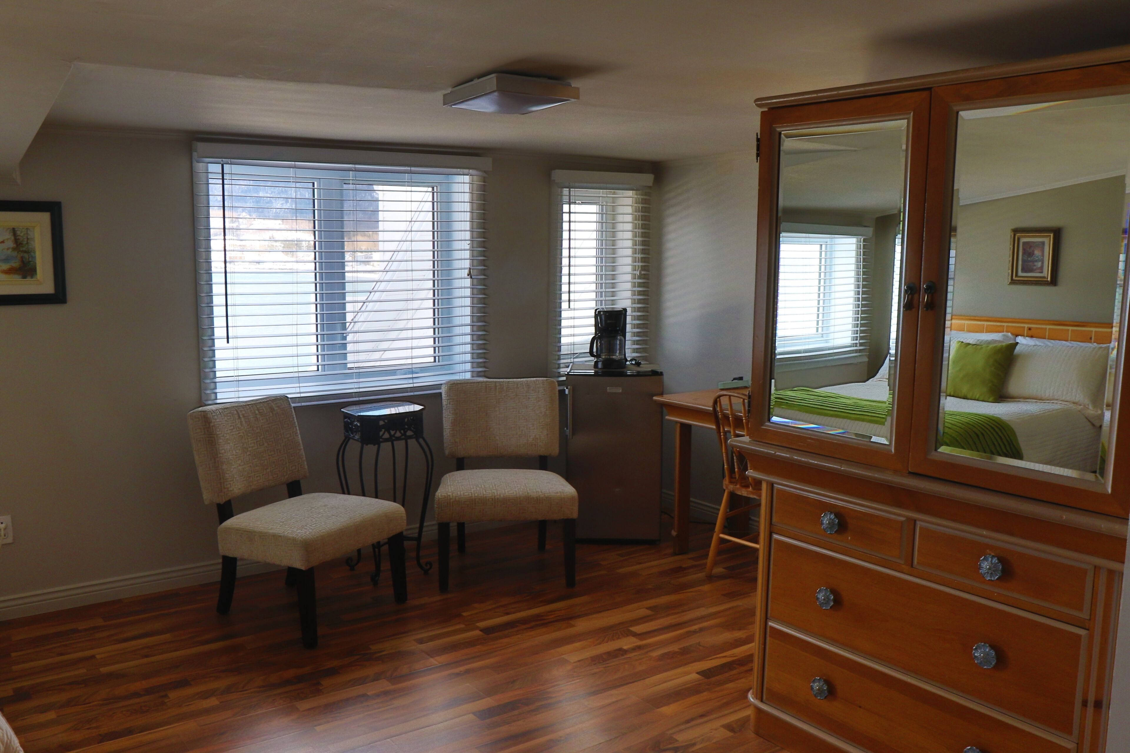 standard room, 2 double beds (plus) | living area | tv