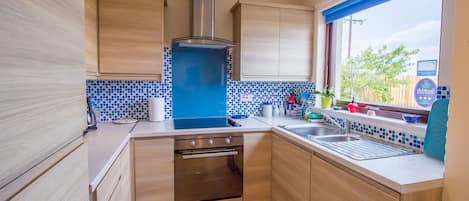 Rumah Standar, 2 kamar tidur | Dapur pribadi | Lemari es, microwave, oven, dan kompor