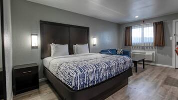 Suite estándar, 1 cama King size | 1 habitación, camas con pillow-top, escritorio y cortinas blackout