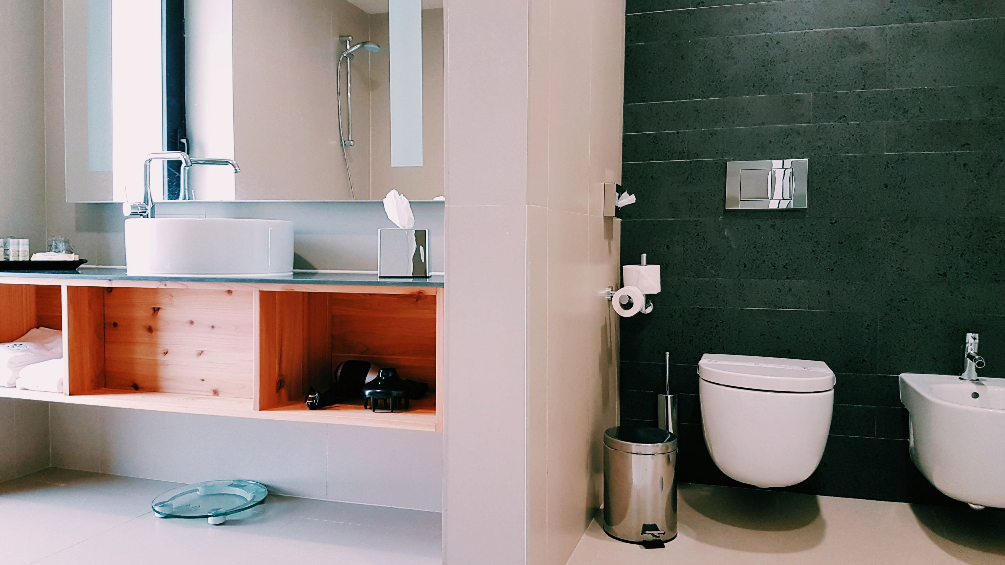 bathtub, eco-friendly toiletries, hair dryer, bathrobes