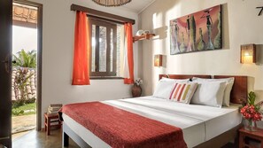 Kamar Double, area taman | Minibar, brankas, Wi-Fi gratis, dan seprai linen