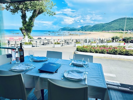 Breakfast, lunch, dinner served; Mediterranean cuisine, beach views