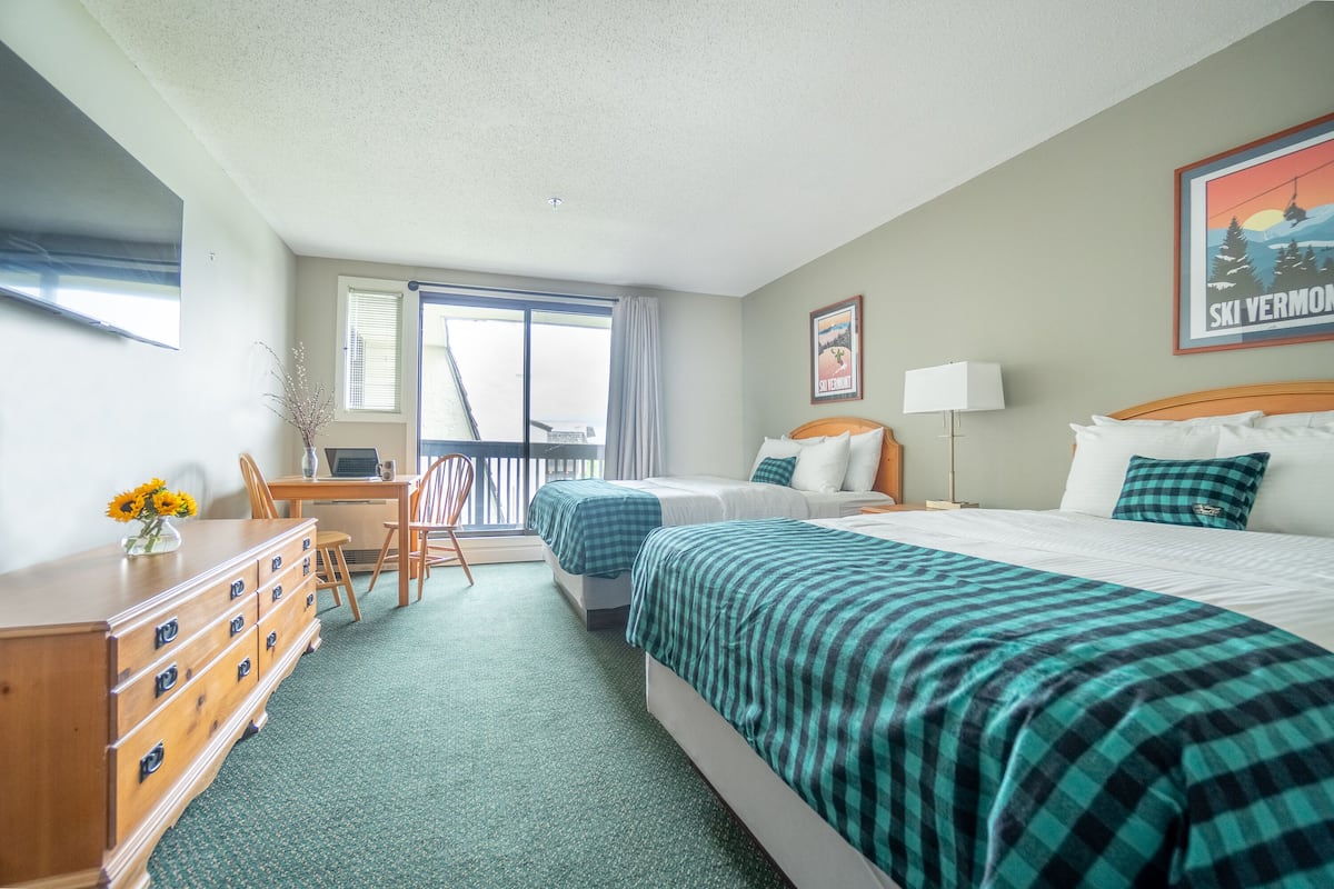 Village View Two Queen Beds With Balcony | Blackout drapes, iron/ironing board, free WiFi, bed sheets