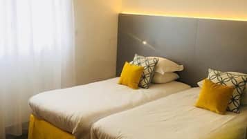 Mini-bar avec articles gratuits, coffres-forts dans les chambres