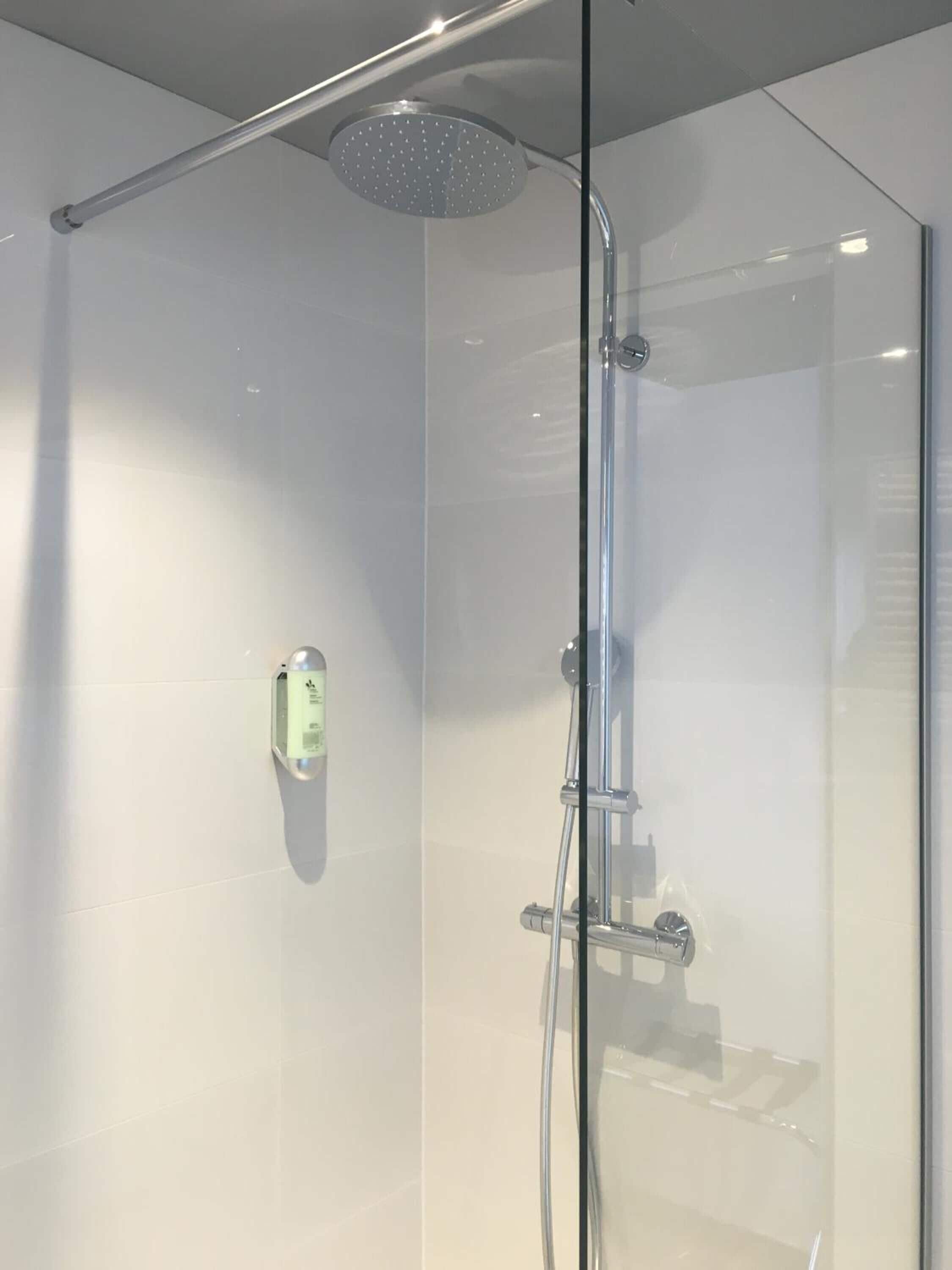 shower, free toiletries, hair dryer, slippers