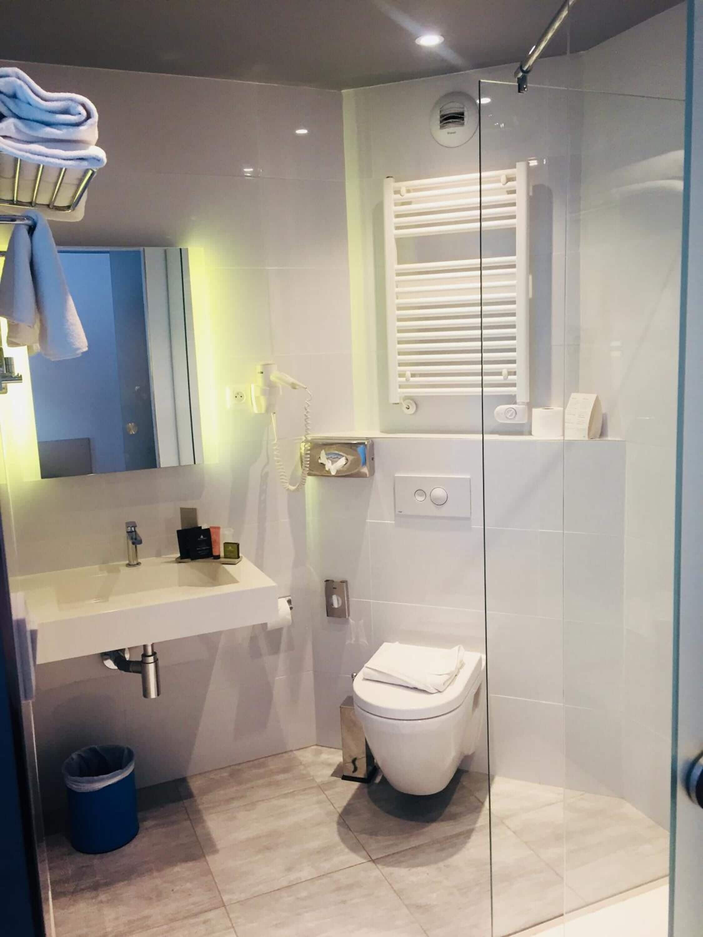 shower, free toiletries, hair dryer, slippers