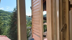 Classic Triple Room, Mountain View (Attic) | Blackout drapes, soundproofing, free WiFi, bed sheets