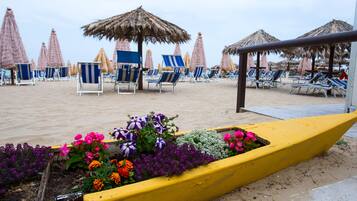 Private beach nearby, sun loungers, beach umbrellas, beach bar