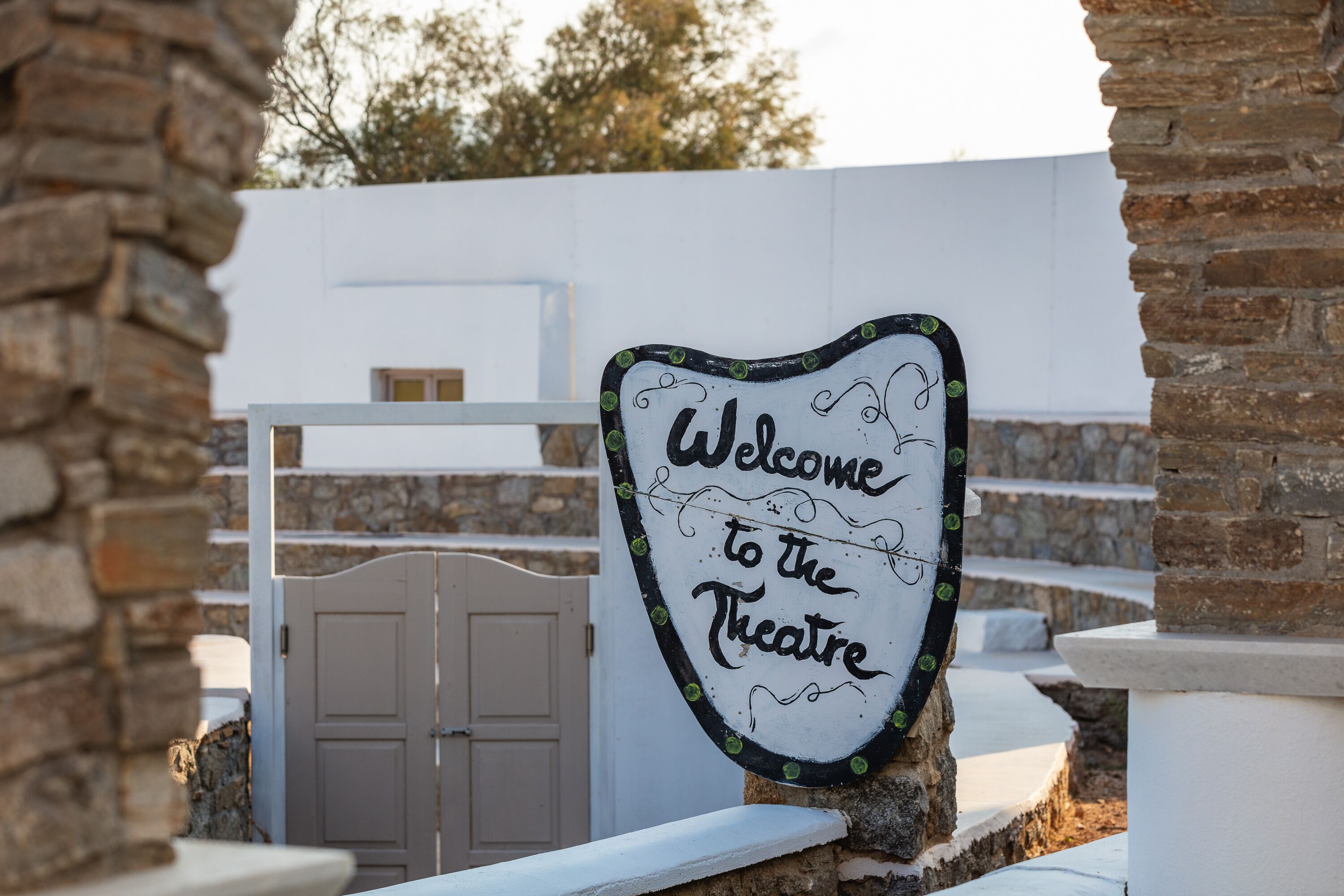 A sign welcoming visitors to the theatre.