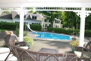 Seasonal outdoor pool, open 10 AM to 9 PM, pool umbrellas