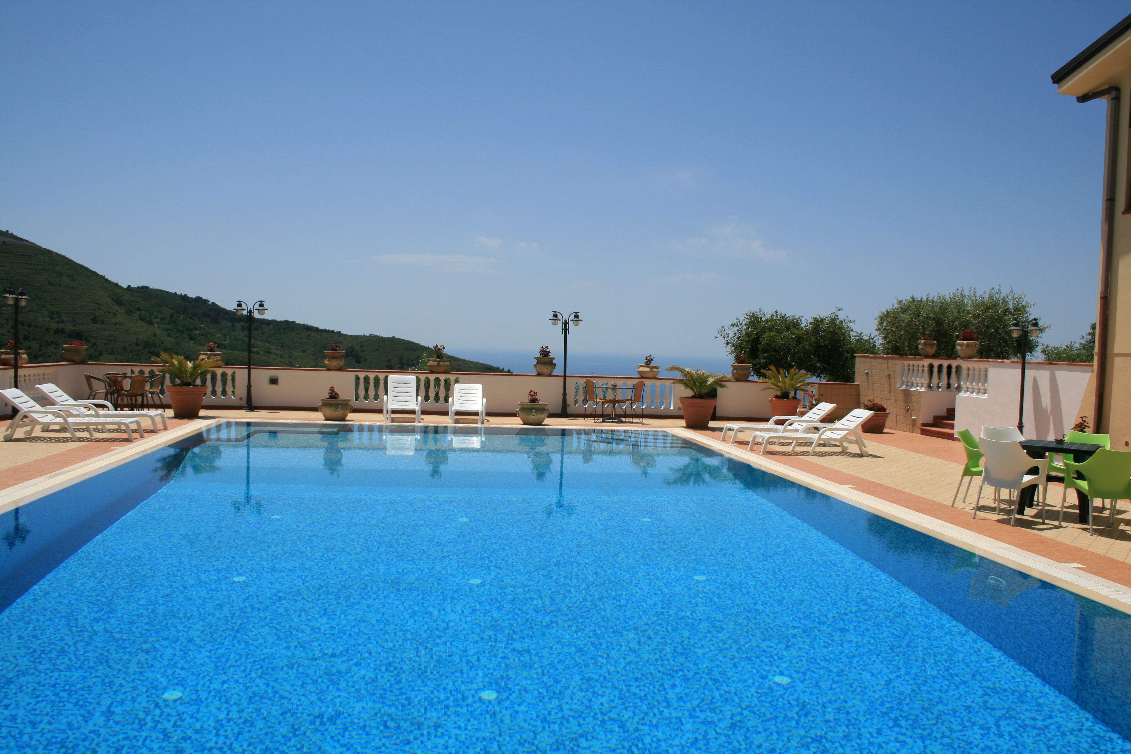 outdoor pool, pool loungers