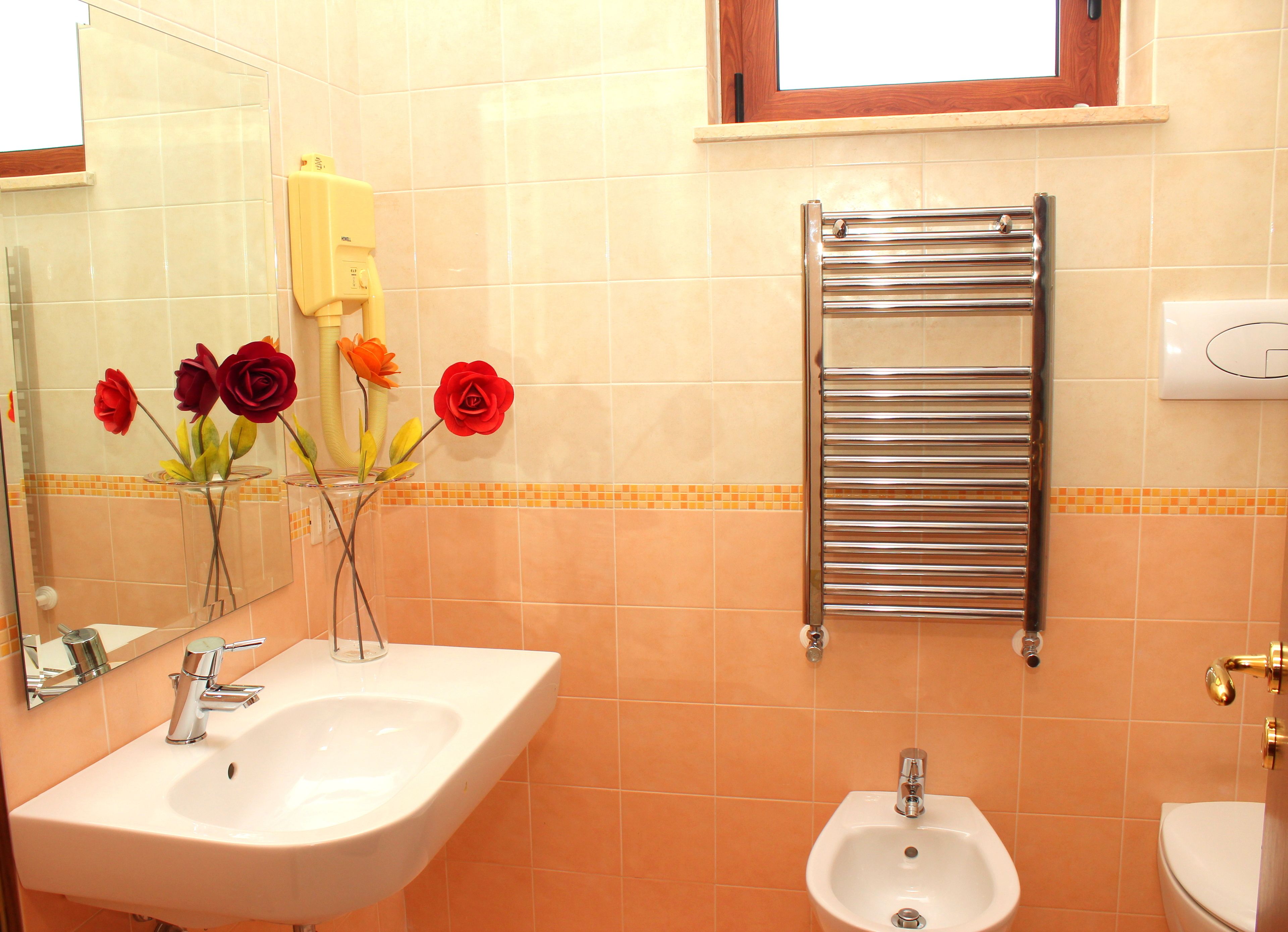 superior triple room | bathroom | shower, free toiletries, hair dryer, bidet