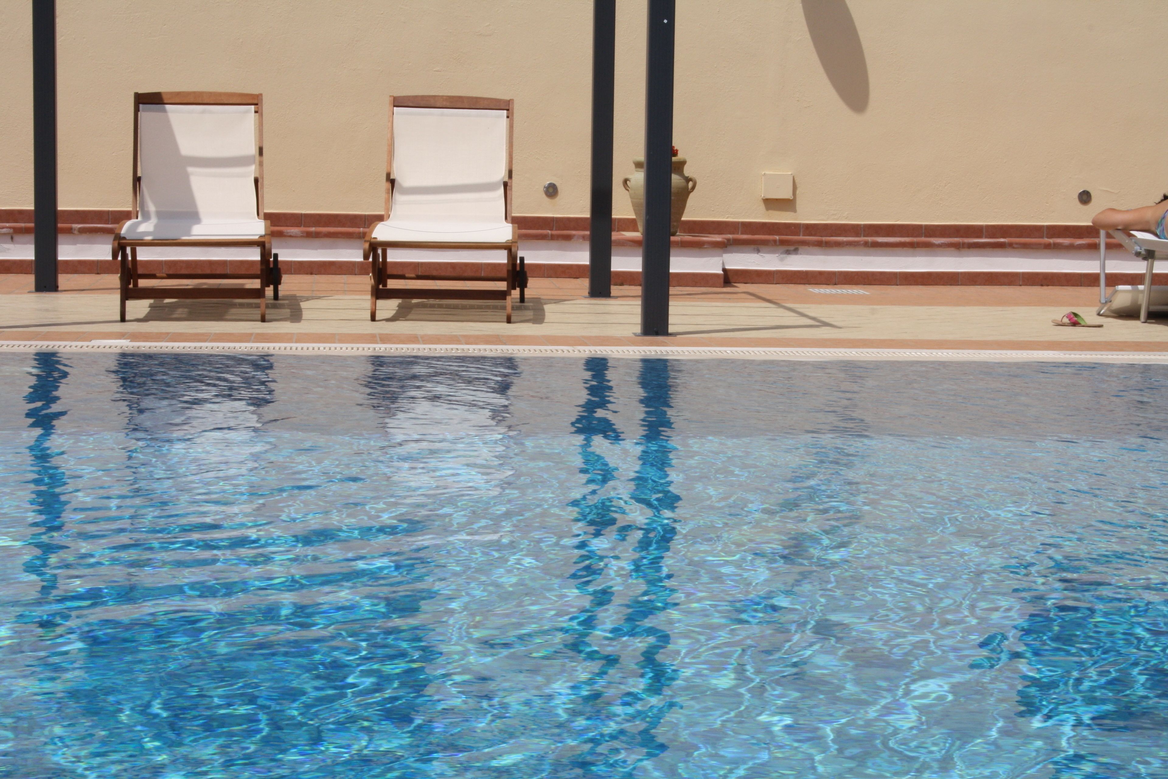 outdoor pool, pool loungers