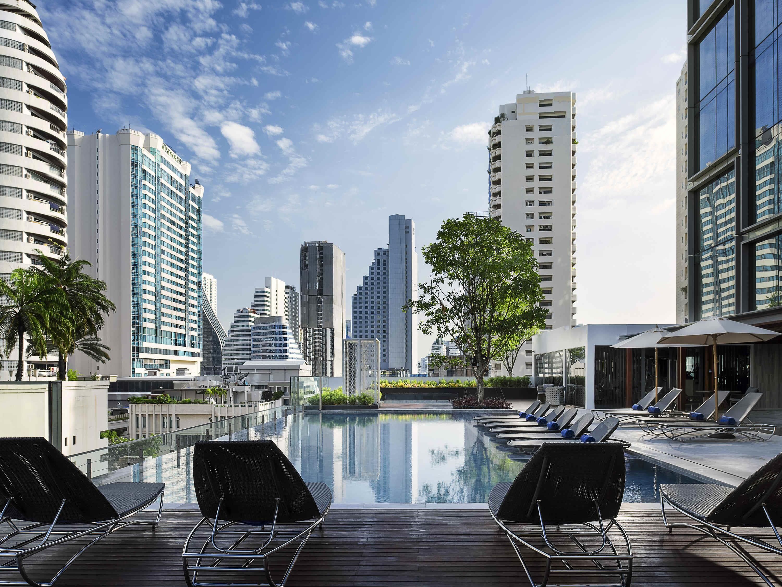 Outdoor pool, pool umbrellas, pool loungers