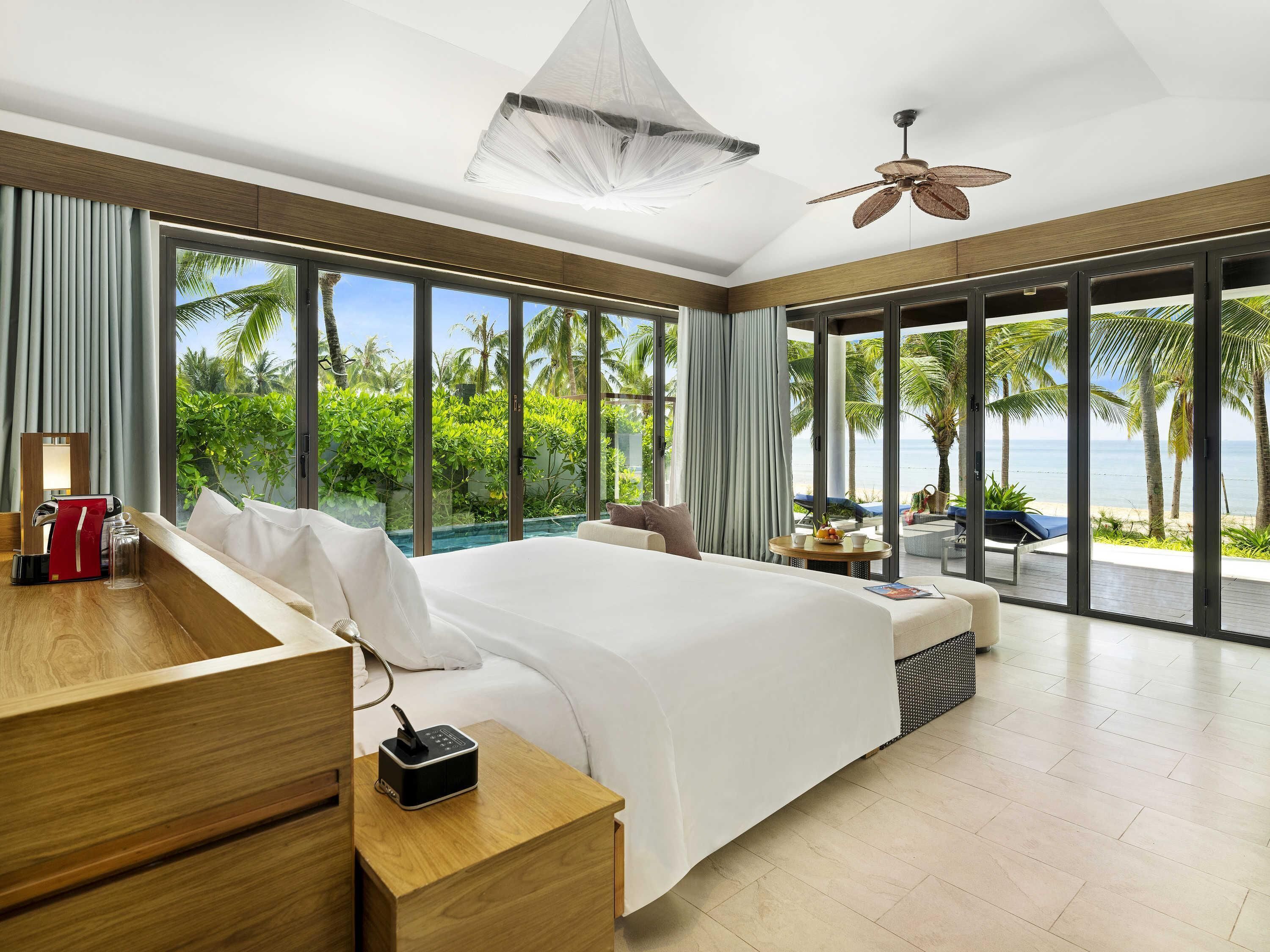 Deluxe Bungalow, 1 King Bed, Private Pool, Beachfront | Minibar, in-room safe, individually decorated, individually furnished
