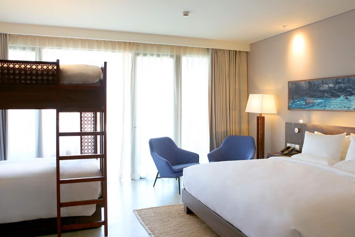 Family Room, Multiple Beds | 1 bedroom, minibar, in-room safe, individually decorated