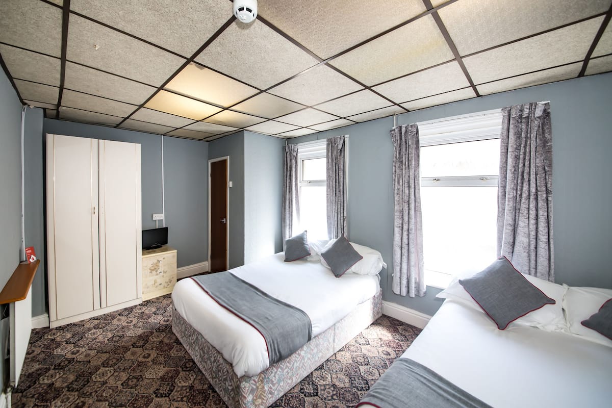 Habitación cuádruple Deluxe