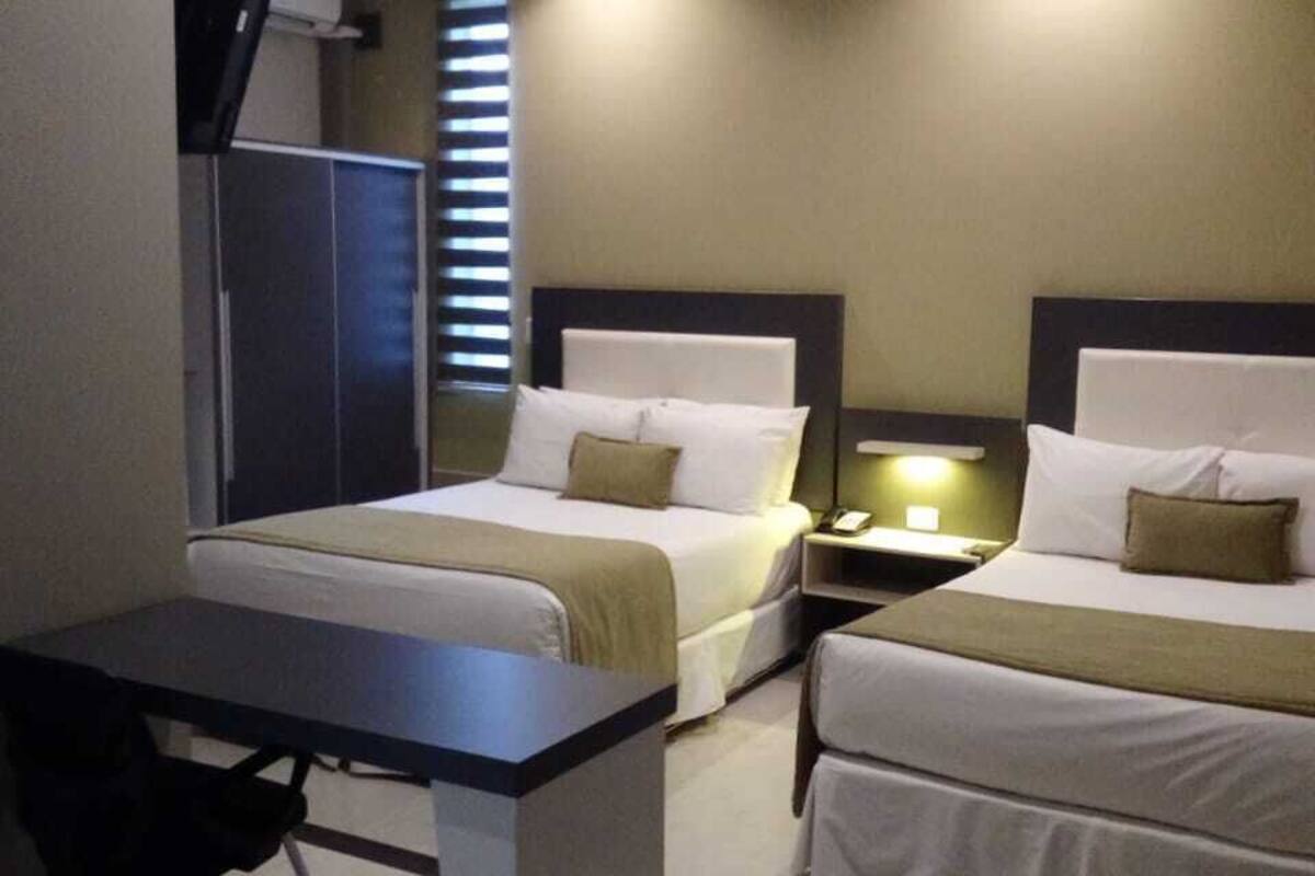 twin room | minibar, in-room safe, desk, iron/ironing board