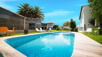 Outdoor pool, sun loungers