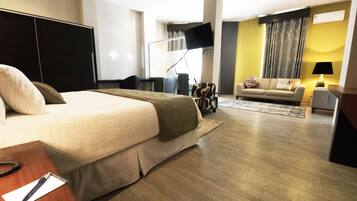 Suite, 1 Bedroom | Minibar, in-room safe, desk, soundproofing