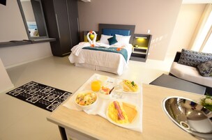 Suite, 1 Bedroom | Minibar, in-room safe, desk, iron/ironing board
