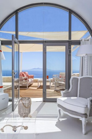 Deluxe Villa, 5 Bedrooms, Private Pool, Sea View | Living area | LCD TV, iPod dock - Kamini Santorini Luxury Villas (Santorini)