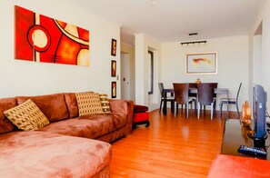 Apartment, 3 Bedrooms | Living area | 40-inch flat-screen TV with cable channels, TV, DVD player - Peru Apartments 4 Rent (Lima)