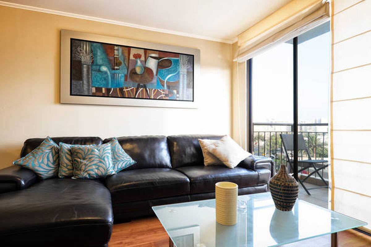 Apartment, 1 Bedroom, Balcony | Living room | 40-inch flat-screen TV with cable channels, TV, DVD player