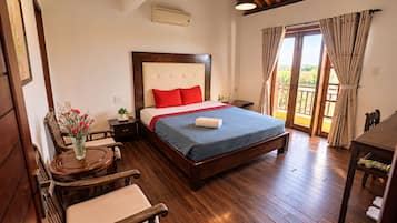 Deluxe Double Room, River View | 1 bedroom, minibar, in-room safe, desk
